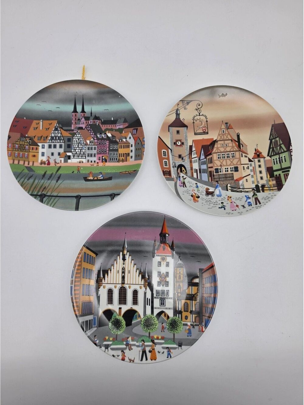 Set of 3 Jaeger & Co. Porcelain Plates Featuring Bavarian Town Scenes